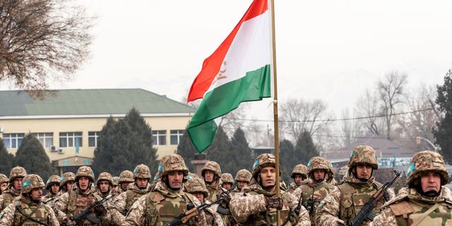 Tajik soldiers attend a ceremony marking the end of the CSTO mission in Almaty on January 13, 2022.