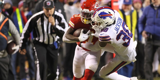 Football: NFL Playoffs: Kansas City Chiefs Jerick McKinnon (1) in action vs Buffalo Bills Dane Jackson (30) at Arrowhead Stadium. Kansas City, MO 1/23/2022