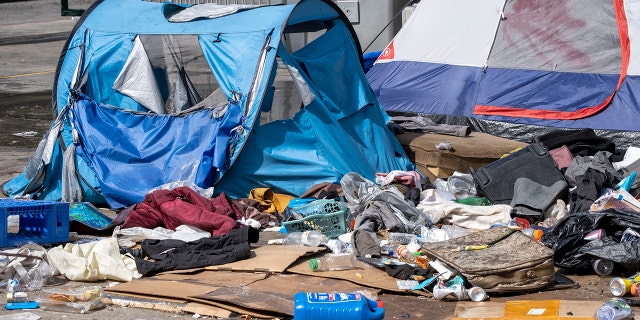 Los Angeles, CA - March 17: Tents and belongings at a homeless encampment in Toriumi Plaza at 1st St and Judge John Aiso St in Los Angeles Thursday, March 17, 2022.  