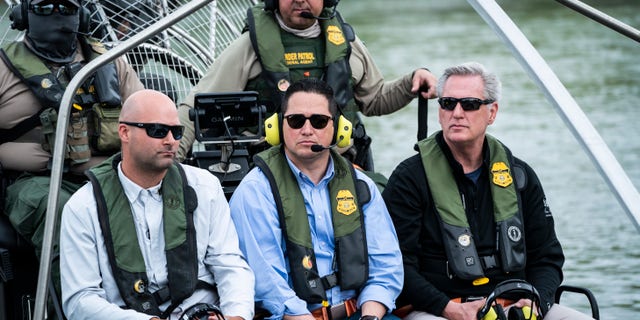 Rep. Tony Gonzales, R-Texas, center, and House Minority Leader Kevin McCarthy, R-Calif., ride a U.S. Border Patrol air boat on a tour of the U.S.-Mexico border on Monday, April 25, 2022 in Eagle Pass, TX. 