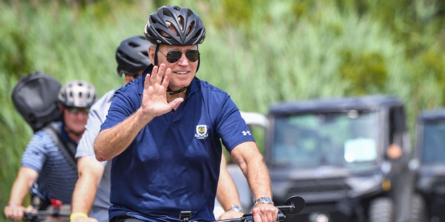 President Biden rides a bike through Gordon's Pond State Park in Rehoboth Beach, Delaware on July 10, 2022. 