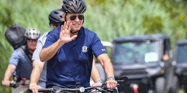 President Biden rides a bike through Gordon's Pond State Park in Rehoboth Beach, Delaware on July 10, 2022.
