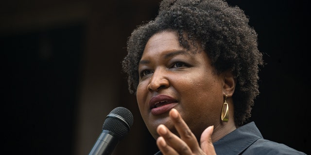 CLAYTON, GA - JULY 28: Georgia gubernatorial candidate Stacey Abrams speaks to supporters and members of the Rabun County Democrats group on July 28, 2022 in Clayton, Georgia.