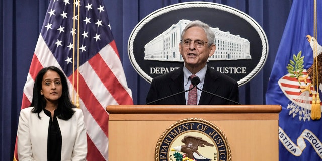 Associate Attorney General Vanita Gupta listens as Attorney Merrick Garland speaks during a news conference on Aug. 2, 2022, in Washington.