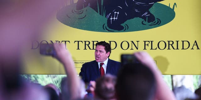 Gov. Ron DeSantis speaks to supporters at a campaign stop on the Keep Florida Free Tour at the Horsepower Ranch in Geneva.