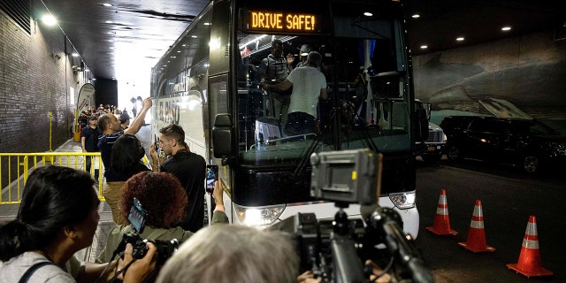 A bus with migrants on board, originating in Texas, arrives at Port Authority Bus Terminal in New York City on August 25, 2022. 