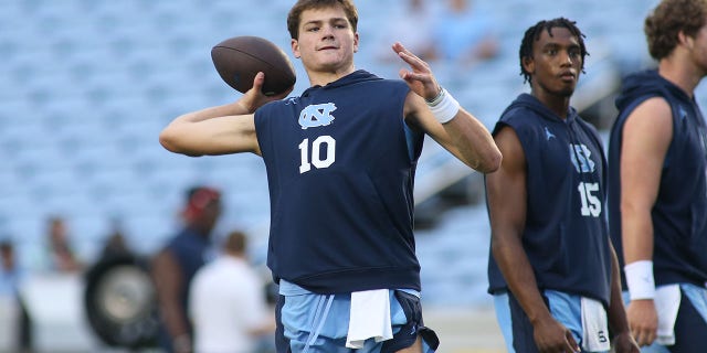 North Carolina Tar Heels quarterback Drake Maye, #10, throws the ball during warmups before the college football game between the North Carolina Tar Heels and the Florida A&M Rattlers on August, 27, 2022, at Kenan Memorial Stadium in Chapel Hill, North Carolina.