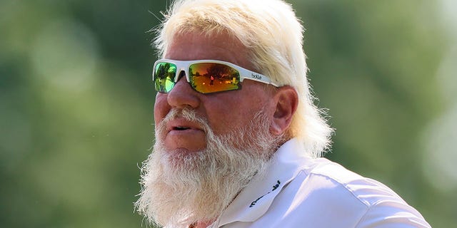 John Daly follows his shot from the 6th tee during the final round of The Ally Challenge at Warwick Hills Golf and Country Club in Grand Blanc, Michigan, on Aug. 28, 2022.