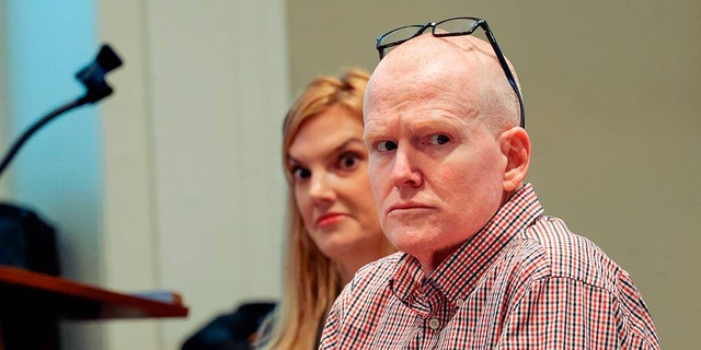 Alex Murdaugh sits in court with his legal team, including attorney Margaret Fox, during a judicial hearing before Judge Clifton Newman in the Colleton County Courthouse in Walterboro, South Carolina, on Aug. 29, 2022.