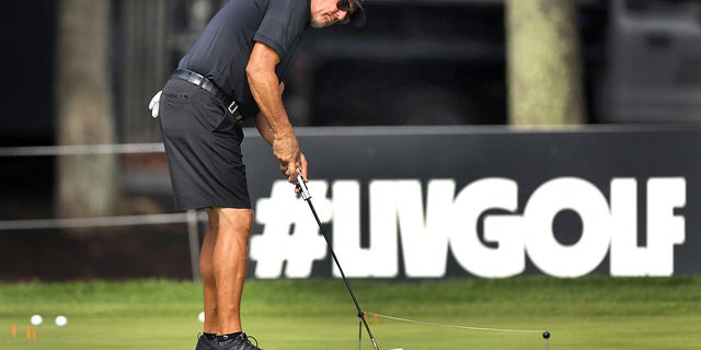 The LIV Golf Boston Invitational kicked off at the International Golf Course. Phil Mickelson practiced on the putting green. 
