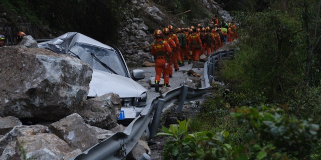 GANZI, CHINA - SEPTEMBER 6, 2022 - Rescuers search for victims on a mountain in Luding county, Ganzi prefecture, Southwest China's Sichuan province, Sept 6, 2022. The 6.8-magnitude earthquake has killed 65 people.