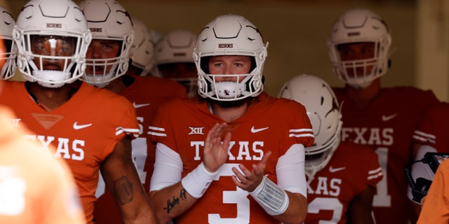 Texas Longhorns quarterback Quinn Ewers (3) leads the team onto the field during a game against the University of Louisiana Monroe Warhawks Sept. 3, 2022, at Darrell K Royal-Texas Memorial Stadium in Austin, Texas. 