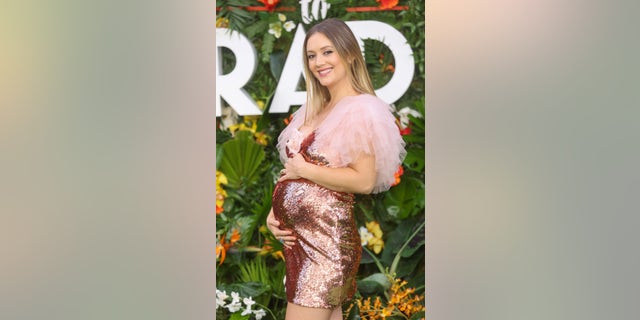 Billie Lourd announced her pregnancy with her second child on the red carpet for "Ticket to Paradise."