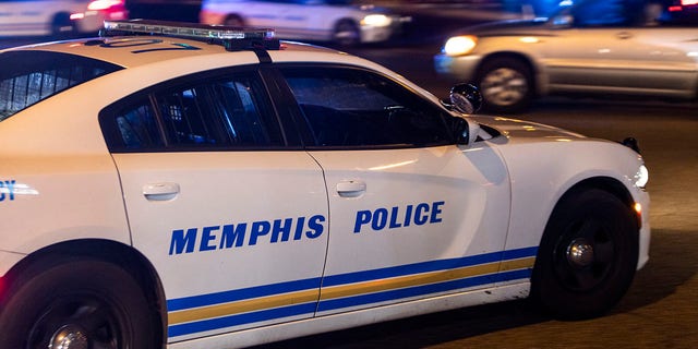 Police investigate the scene of a reported carjacking reportedly connected to a series of shootings on September 7, 2022 in Memphis, Tennessee.
