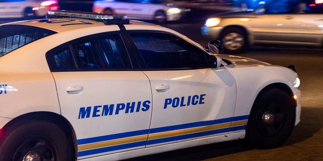 Police investigate the scene of a reported carjacking reportedly connected to a series of shootings on September 7, 2022 in Memphis, Tennessee.