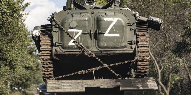 A view of a Russian tank captured by Ukrainian forces being carried in Kharkiv, Ukraine, on Sept. 8, 2022.
