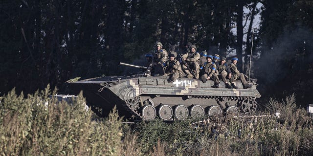 Russian troops pull back as Ukrainian soldiers retake key areas in ...