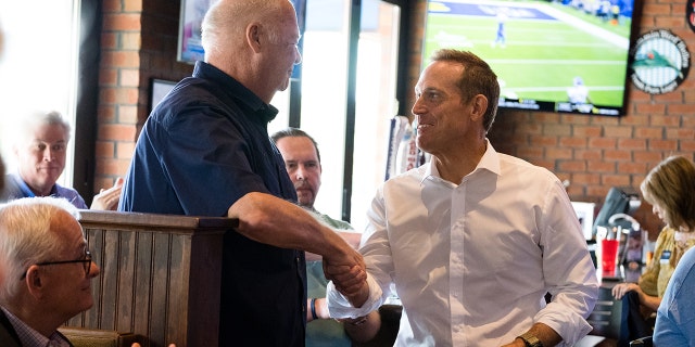 Trump-backed Senate candidate Ted Budd greets an attendee during a campaign event in Greensboro, North Carolina, on Friday, Sept. 9, 2022.