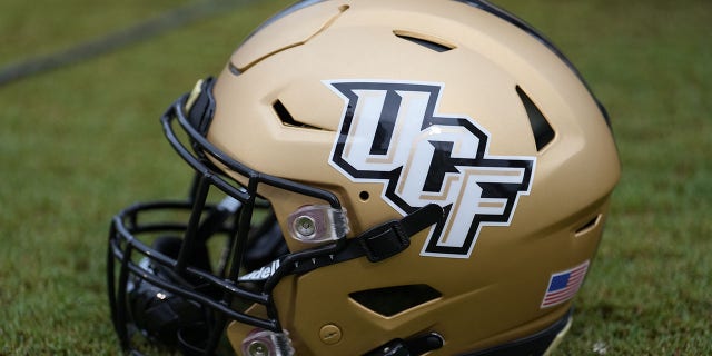 A UCF helmet sits on a sideline during a game between the Louisville Cardinals and the University of Central Florida Knights Sept. 9, 2022, at Bright House Networks Stadium in Orlando, Fla.
