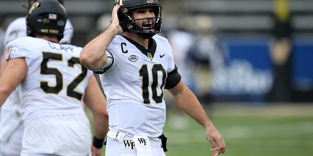 Wake Forest Demon Deacons quarterback Sam Hartman, #10, reacts to throwing a long touchdown pass during the game between the Wake Forest Demon Deacons and the Vanderbilt Commodores on Sept. 10, 2022 at FirstBank Stadium in Nashville, Tennessee.  