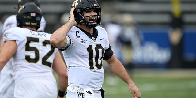 Wake Forest Demon Deacons quarterback Sam Hartman, #10, reacts to throwing a long touchdown pass during the game between the Wake Forest Demon Deacons and the Vanderbilt Commodores on Sept. 10, 2022 at FirstBank Stadium in Nashville, Tennessee.  