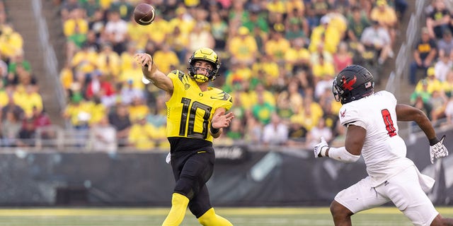 Bo Nix (10) of the Oregon Ducks passes during the first half of a game against the Eastern Washington Eagles at Autzen Stadium Sept. 10, 2022, in Eugene, Ore.