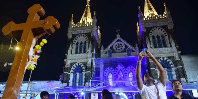 Christians gather for Catholic Mass in Mumbai.