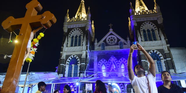 Christians gather for Catholic Mass in Mumbai.