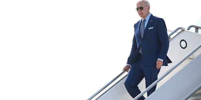 US President Joe Biden steps off Air Force One upon arrival at Detroit Metropolitan Wayne County Airport in Detroit, Michigan on September 14, 2022.