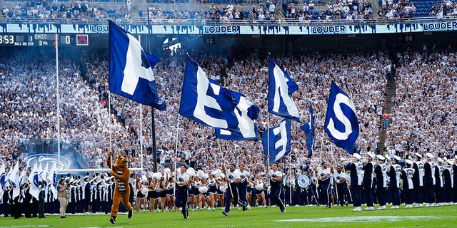 The Penn State Nittany Lion mascot leads the charge onto the field before a game against the Ohio Bobcats Sept. 10, 2022, at Beaver Stadium in University Park, Pa. 