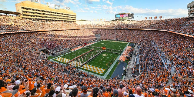 Tennessee Volunteers run through the Power T formation before the college football game between the Tennessee Volunteers and Ball State Cardinals on Sept. 1, 2022, at Neyland Stadium, in Knoxville, TN. 