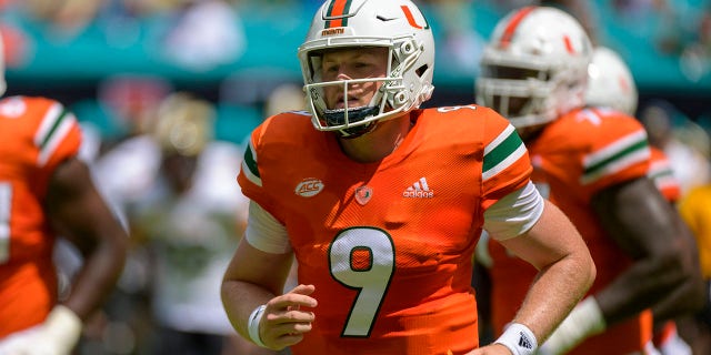 Miami quarterback Tyler Van Dyke (9) jogs on the field before the college football game between the Southern Miss Golden Eagles and the University of Miami Hurricanes on Sept. 10, 2022 at the Hard Rock Stadium in Miami Gardens, FL.