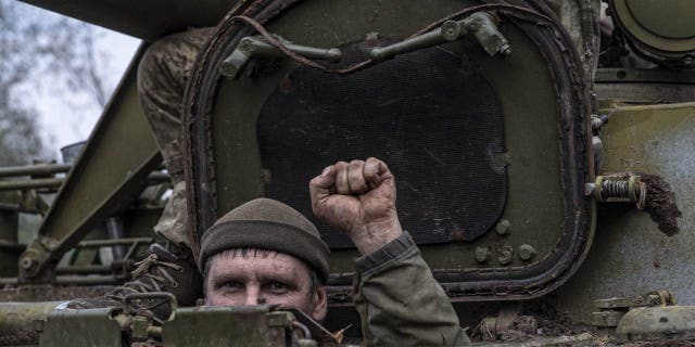 Ukrainian forces are seen in Izyum after Russian forces withdrew from the city in Kharkiv Oblast, Ukraine, on Sept. 16, 2022.