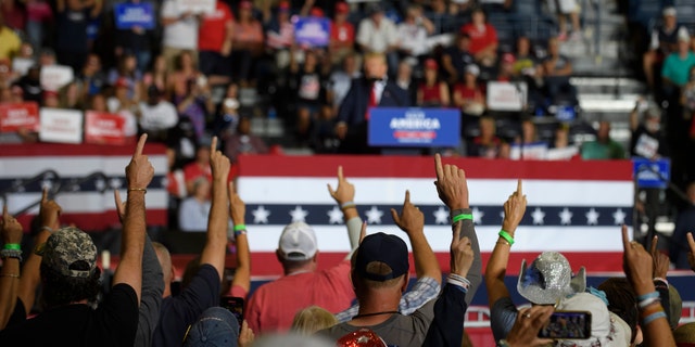 YOUNGSTOWN, OH - SEPTEMBER 17: Audience members put their index finger up while President Donald Trump speaks at a Save America Rally to support Republican candidates running for state and federal offices in Ohio. 