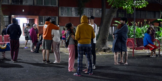 People are seen at the Tlatelolco neighborhood after a 6.8-magnitude earthquake in Mexico City on September 22, 2022.