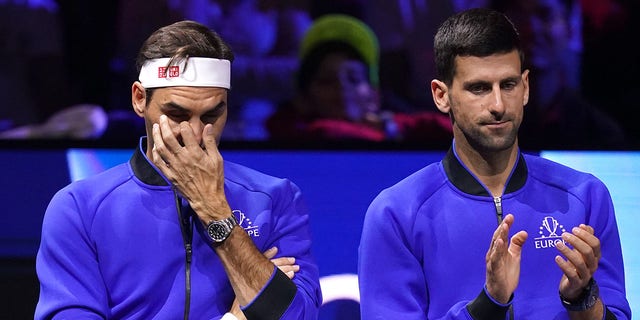 Team Europe's Roger Federer (left) and Novak Djokovic on day one of the Laver Cup at the O2 Arena, London. 