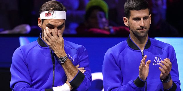 Team Europe's Roger Federer (left) and Novak Djokovic on day one of the Laver Cup at the O2 Arena, London. 