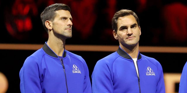 Team Europe's Serbian player Novak Djokovic L and Swiss player Roger Federer attend the trophy ceremony after the Laver Cup tennis tournament between Team World and Team Europe in London, Britain, on Sept. 26, 2022. 