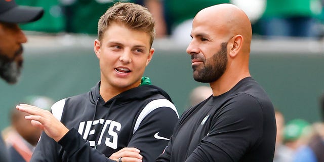 New York Jets quarterback Zack Wilson, left, and New York Jets head coach Robert Saleh talk before a game against the Cincinnati Bengals.  September 25, 2022 at MetLife Stadium in East Rutherford, NJ  