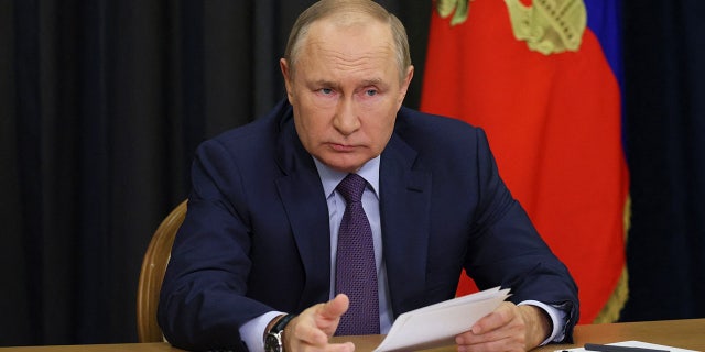 Russian President Vladimir Putin chairs a meeting on agriculture issues via a video link in Sochi on Sept. 27, 2022. 