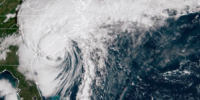 In this NOAA handout image taken by the GOES satellite at 13:26 UTC, Hurricane Ian approaches the Atlantic coast of northern Florida, Georgia, and the Carolinas on September 30, 2022 in the Atlantic Ocean. 