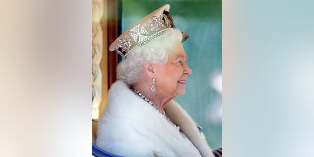 On May 27, 2015, Queen Elizabeth II wore the Diamond Diadem made for King George IV by Rundell, Bridge and Rundell in 1820. She wore the diadem while she traveled down The Mall in the Diamond Jubilee State Coach after attending the State Opening of Parliament, in London, England.