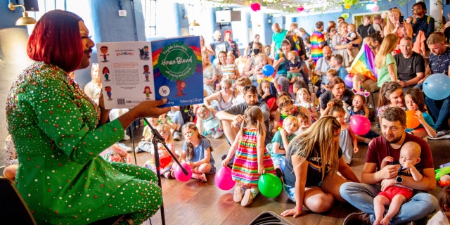 "Drag Queen Storytime" events have grown in popularity in recent years, as seen here in Manchester, England in 2021.