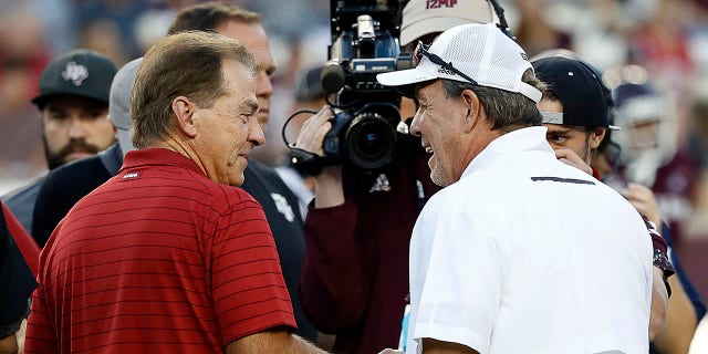 Lane Kiffin takes a swipe at Texas A&M discussing former defensive coordinator: 'We outbid' 2 Head Coach Nick Saban of the Alabama Crimson Tide meets with Head Coach Jimbo Fisher of the Texas A&M Aggies at Kyle Field on October 9, 2021 in College Station, Texas.