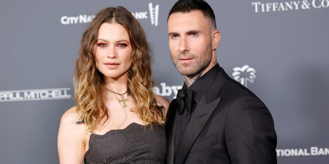 Adam Levine is reportedly trying "his best to make things better" with Prinsloo.