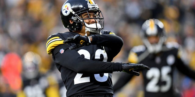 Joe Haden, #23 of the Pittsburgh Steelers, celebrates a stop on fourth down in the fourth quarter to end the game at Heinz Field on Dec. 19, 2021 in Pittsburgh.