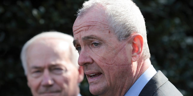 New Jersey Gov. Phil Murphy and Arkansas Gov. Asa Hutchinson, Chairman of the National Governors Association, speak outside the White House after a meeting with President Joe Biden and members of the National Governors Association on January 31, 2022, in Washington, D.C. 