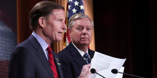 WASHINGTON, DC - MAY 10: Sen. Lindsey Graham (R) (R-SC) listens as Sen. Richard Blumenthal (L) (D-CT) speaks during a press conference at the U.S. Capitol May 10, 2022, in Washington, DC. 