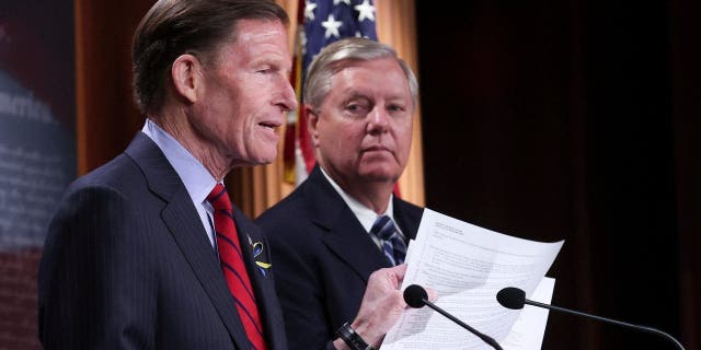 WASHINGTON, DC - MAY 10: Sen. Lindsey Graham (R) (R-SC) listens as Sen. Richard Blumenthal (L) (D-CT) speaks during a press conference at the U.S. Capitol May 10, 2022, in Washington, DC.