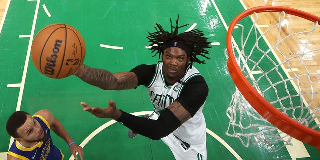 Robert Williams III of the Boston Celtics shoots against the Golden State Warriors in Game 6 of the 2022 NBA Finals at TD Garden June 16, 2022, in Boston. 